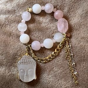 Pink and pale pink stone bracelet with Buddha head charm / carved clear crystal